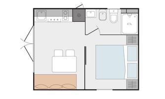 A simple floor plan drawing of a small room with a bedroom, bathroom, and kitchenette. The room is designed to be functional and compact.