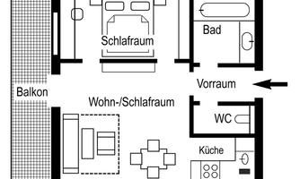 The image shows a floor plan of an apartment with a bedroom, a living/sleeping area, a kitchen, a bathroom, and a toilet. A balcony is also indicated.