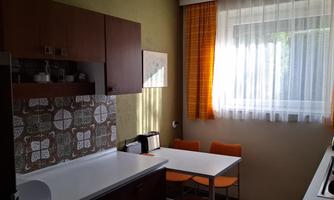 Kitchen with a small dining area