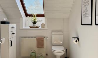 A modern bathroom with a skylight and natural light. There is a toilet, a sink, and decorative elements such as plants and lights.