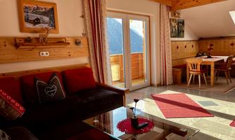 View from the living area towards the balcony, which offers a fantastic view of the Großglockner mountains.
