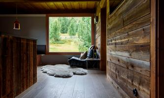 Here you can see the large panoramic window in the living-dining area with a wonderful view of the mountains.