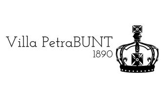 An elegant logo of Villa PetraBUNT from 1890. It features a stylized crown and has a classic lettering.