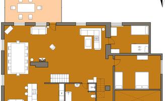 A floor plan drawing of an apartment with an open living and dining area. There are two bedrooms, a kitchen, and a bathroom.