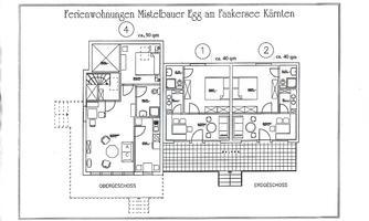 A floor plan of vacation apartments in Egg am Faaker See, Carinthia. The drawing shows two separate units and a communal area.