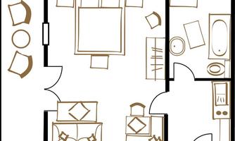 A simple floor plan drawing of a room. The room contains furniture such as a bed, a table, and chairs.