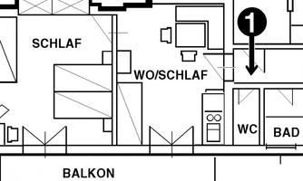The image shows a floor plan of an apartment. The rooms are clearly marked, including bedroom, bathroom, and balcony.