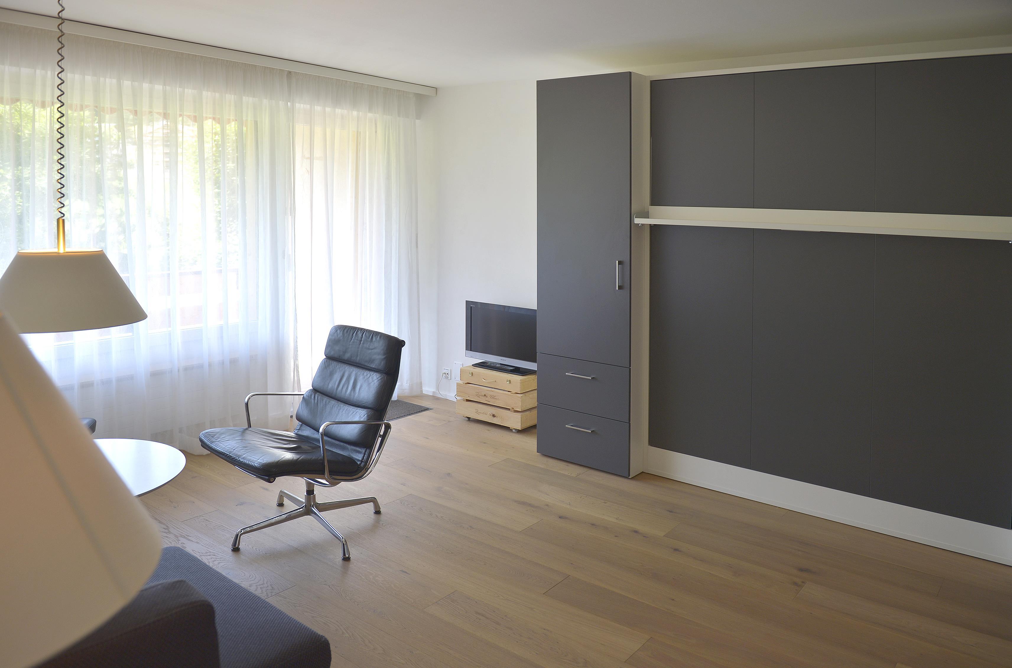 Wohnbereich mit Schrankbetten Wohnbereich mit Schrankbetten