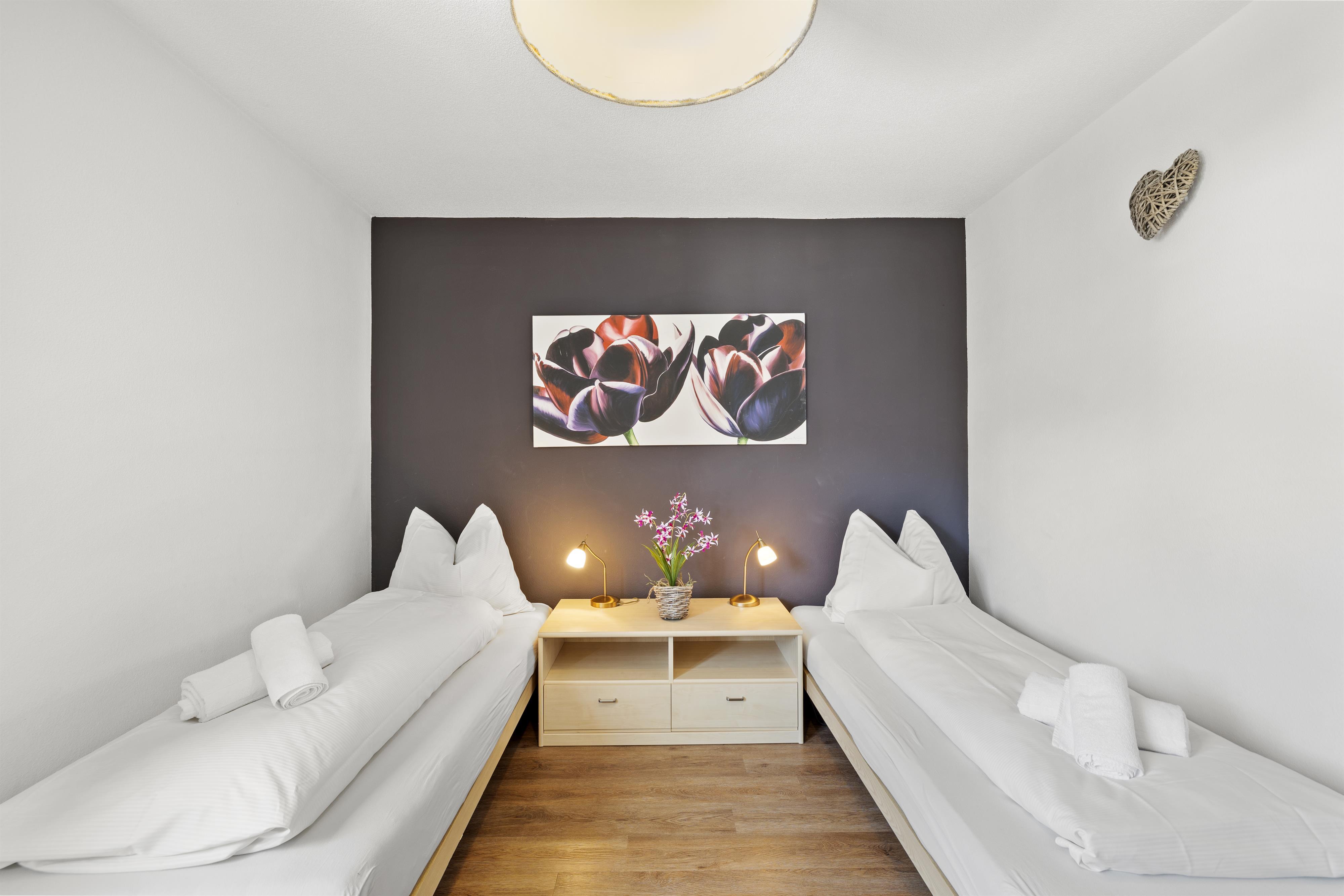 Schlafzimmer 1 mit Einzelbetten Schlafzimmer 1 mit Einzelbetten