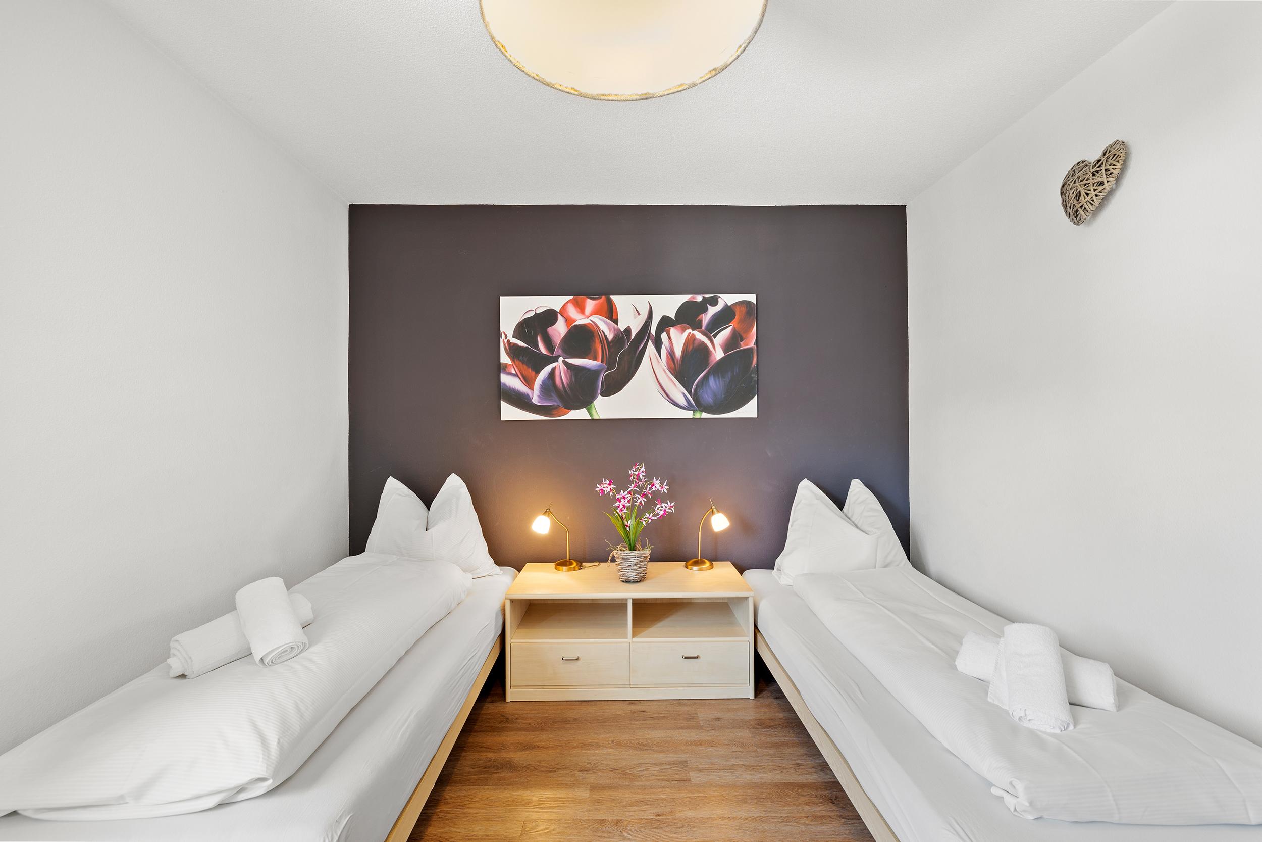 Schlafzimmer 1 mit Einzelbetten Schlafzimmer 1 mit Einzelbetten