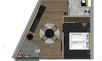 A modern living space design with an open living and dining area. The design includes a cozy seating corner and a bedroom niche.