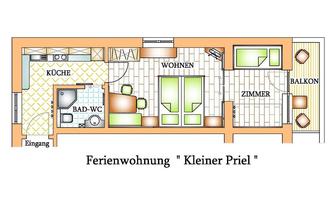 A floor plan drawing of a vacation apartment with a living area, a bedroom, a kitchen, and a balcony. The space is clearly structured and names the different areas.