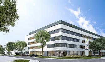 A modern residential building with large windows and a clear blue sky. Surrounded by trees and a well-maintained environment.