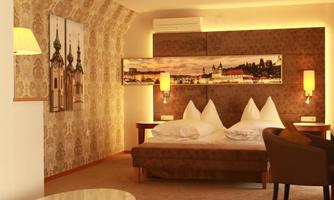 A cozy hotel room with a large bed and stylish decor. The walls are adorned with soft colors and decorative pictures.