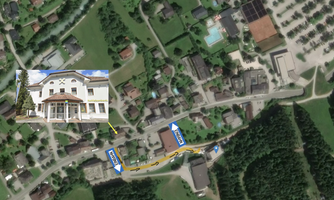 A map with the location of a building that is overlaid in the image. The arrows indicate the way to a nearby destination.