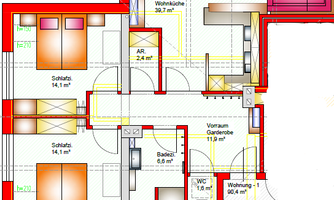This is a floor plan of a building with several rooms, including bedrooms, bathrooms, and a living area. The plan shows a structured arrangement of the rooms and serves as a visual representation of the use of space.