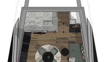 A modern living space layout with a living and dining area as well as a kitchen. The room is bright and functionally designed.