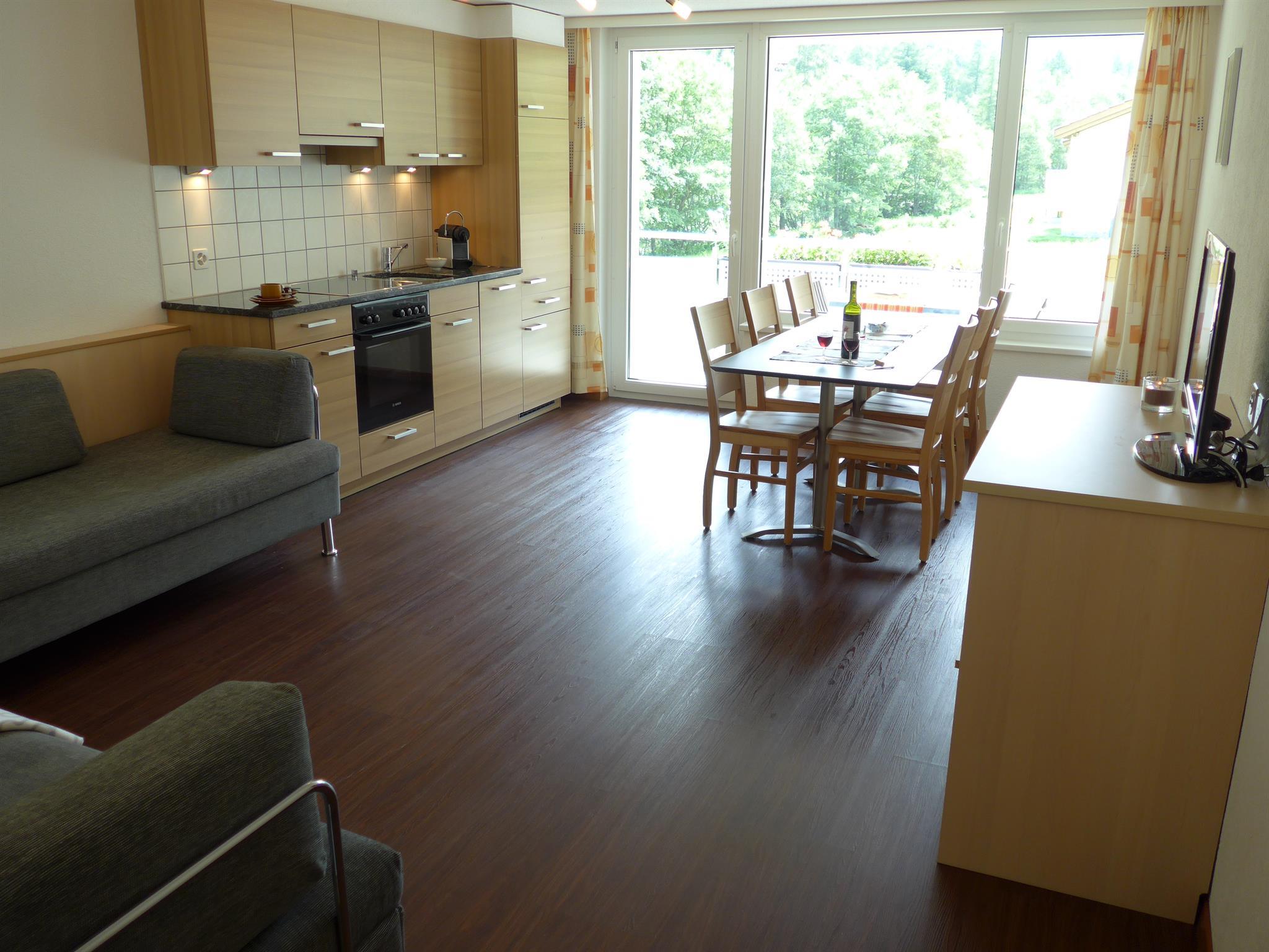 Küche mit Ess- und Wohnraum - 3-Zimmerwohnung OST Küche mit Ess- und Wohnraum - 3-Zimmerwohnung OST