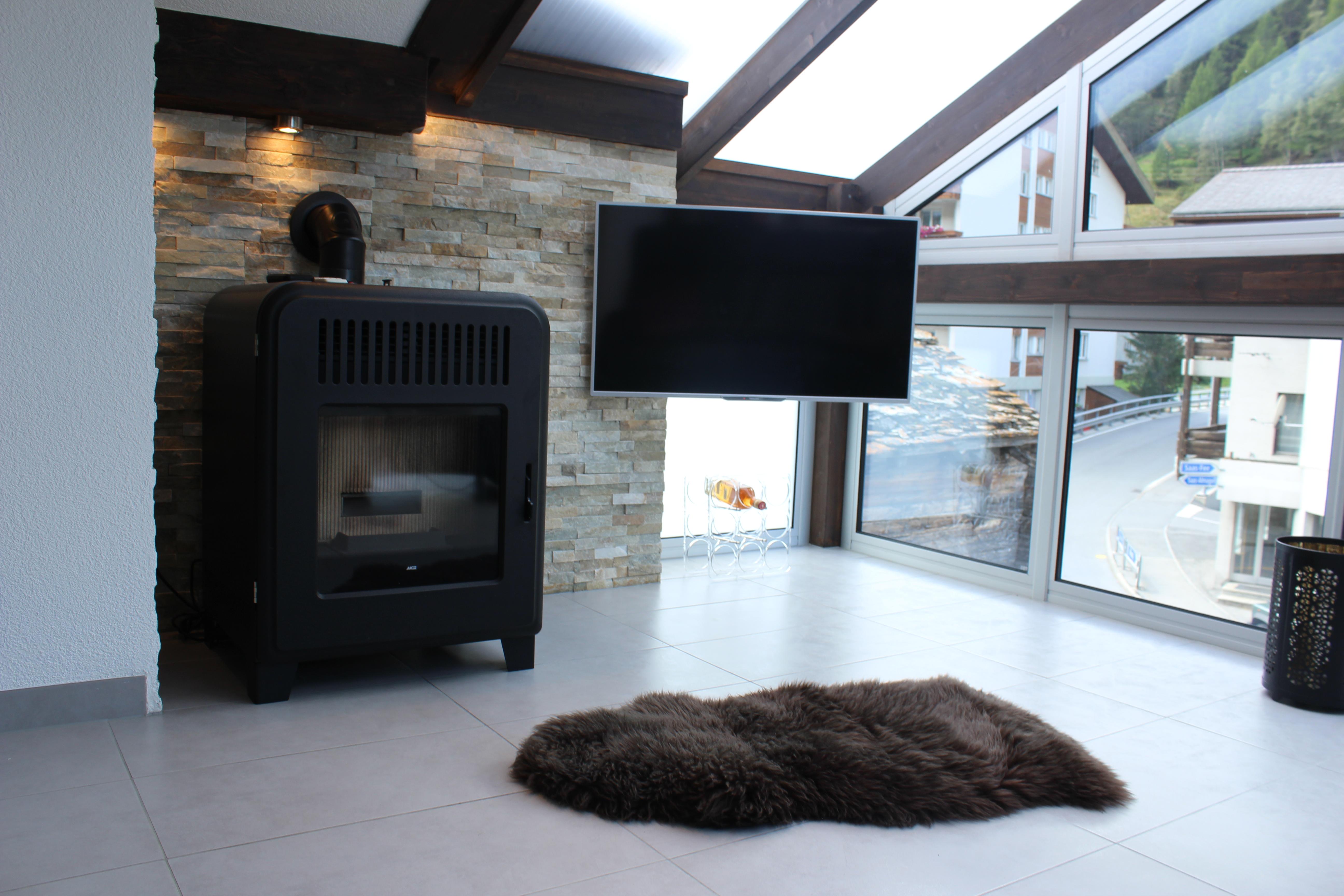 Wohnbereich mit Pelletofen Wohnbereich mit Pelletofen