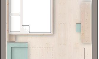 A diagrammatic representation of an apartment with one bedroom, sofa, and dining area. The bathroom is also included.