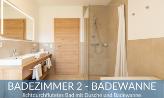 Bright bathroom with bathtub and shower. Modern design with wood and tile elements.