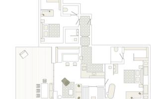 A floor plan of a house with multiple rooms and areas. The drawing shows an open living space, kitchen and dining areas, as well as a terrace.