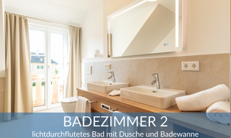 A bright bathroom with a shower and bathtub. There are two sinks and large windows that let in plenty of light.