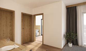 A modern designed interior with bright walls and wooden doors. In the background, a cozy bedroom and plants are visible.