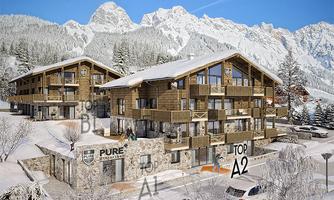 Modern apartments in winter with snow-covered mountains in the background. The buildings are made of wood and stone and are located in a picturesque setting.