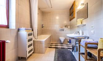 Bathroom with bath and toilet
