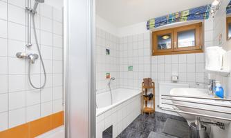 Bathroom with shower, bath, toilet