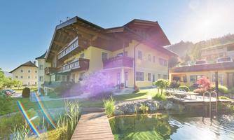 haus-sommer-ansicht-mit-schwimmteich-02-gross