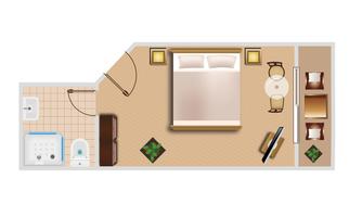 A floor plan of a room with a large bed, a table, and chairs. On the left side, a bathroom is drawn.