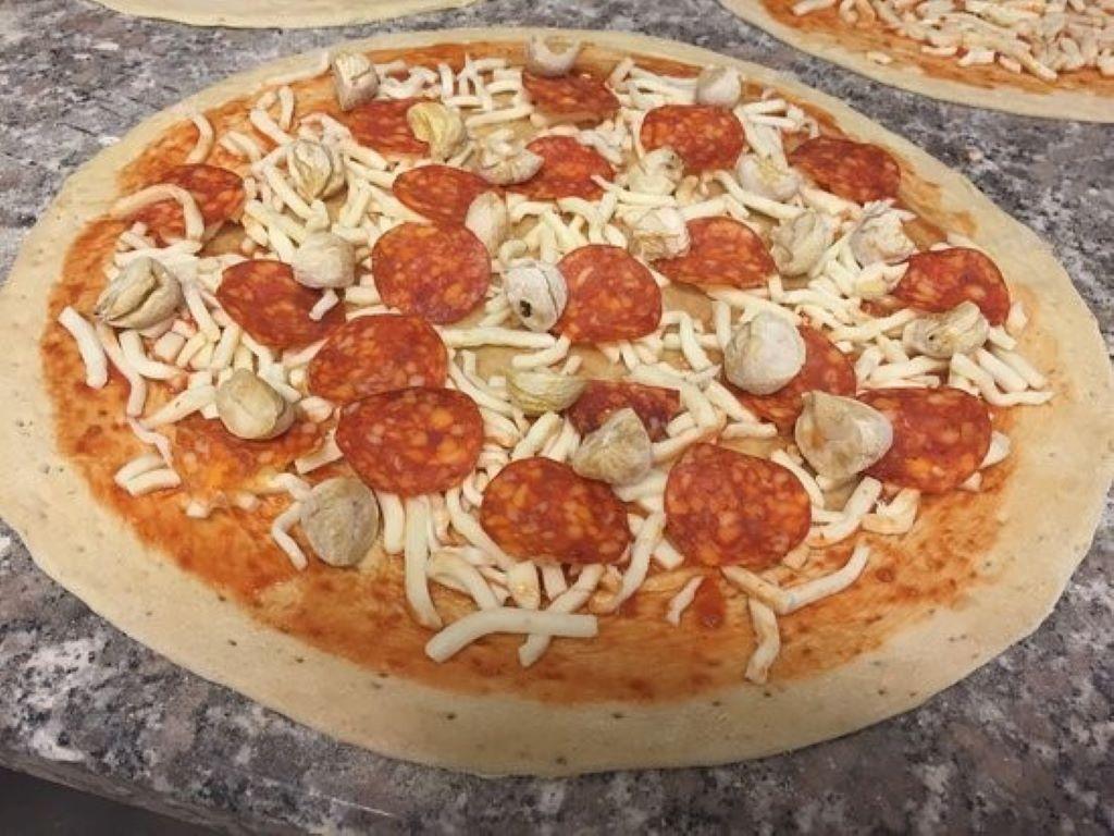 Pizza al taglio e da asporto "Pizza Mania"
