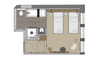 A floor plan of a room with two beds, a bathroom, and a small kitchenette. The space is clearly structured and functionally designed.