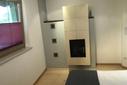 Schlafzimmer 2 mit Kachelofen Schlafzimmer 2 mit Kachelofen