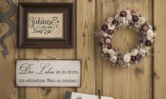 A rustic wall area with wood paneling. The beautiful crown and the signs convey a cozy atmosphere.