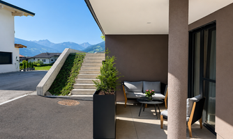 Right next to the inviting terrace is the assigned parking space.